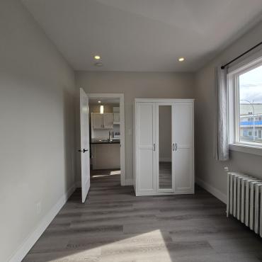 Bedroom w/ Wardrope open